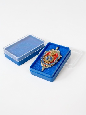 Пластиковый футляр (38х58х17 мм). Светло-синее основание, прозрачная крышка