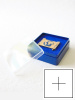 Пластиковый футляр (58х58х22 мм). Светло-синее основание, прозрачная крышка, с отверстием "крест"