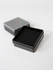 Пластиковый футляр (58х58х22 мм). Чёрное основание, прозрачная крышка